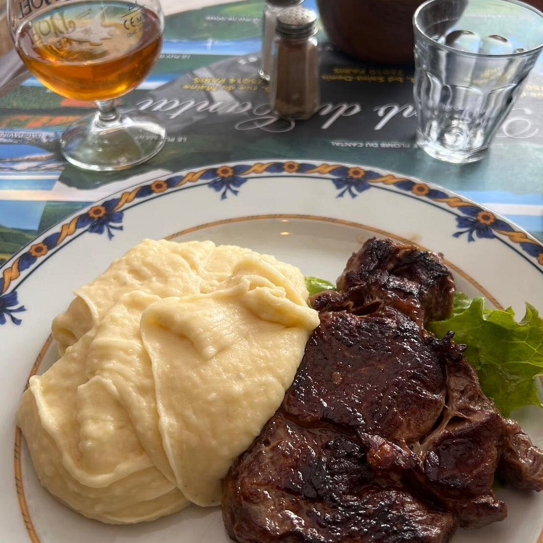 Le Plomb du Cantal signature dishes Aligot (Cheesy Mashed Potatoes)Truffade (Potatoes with Cantal Cheese)Entrecôte (Ribeye Steak)Saucisse d'Auvergne (Auvergne Sausage)
